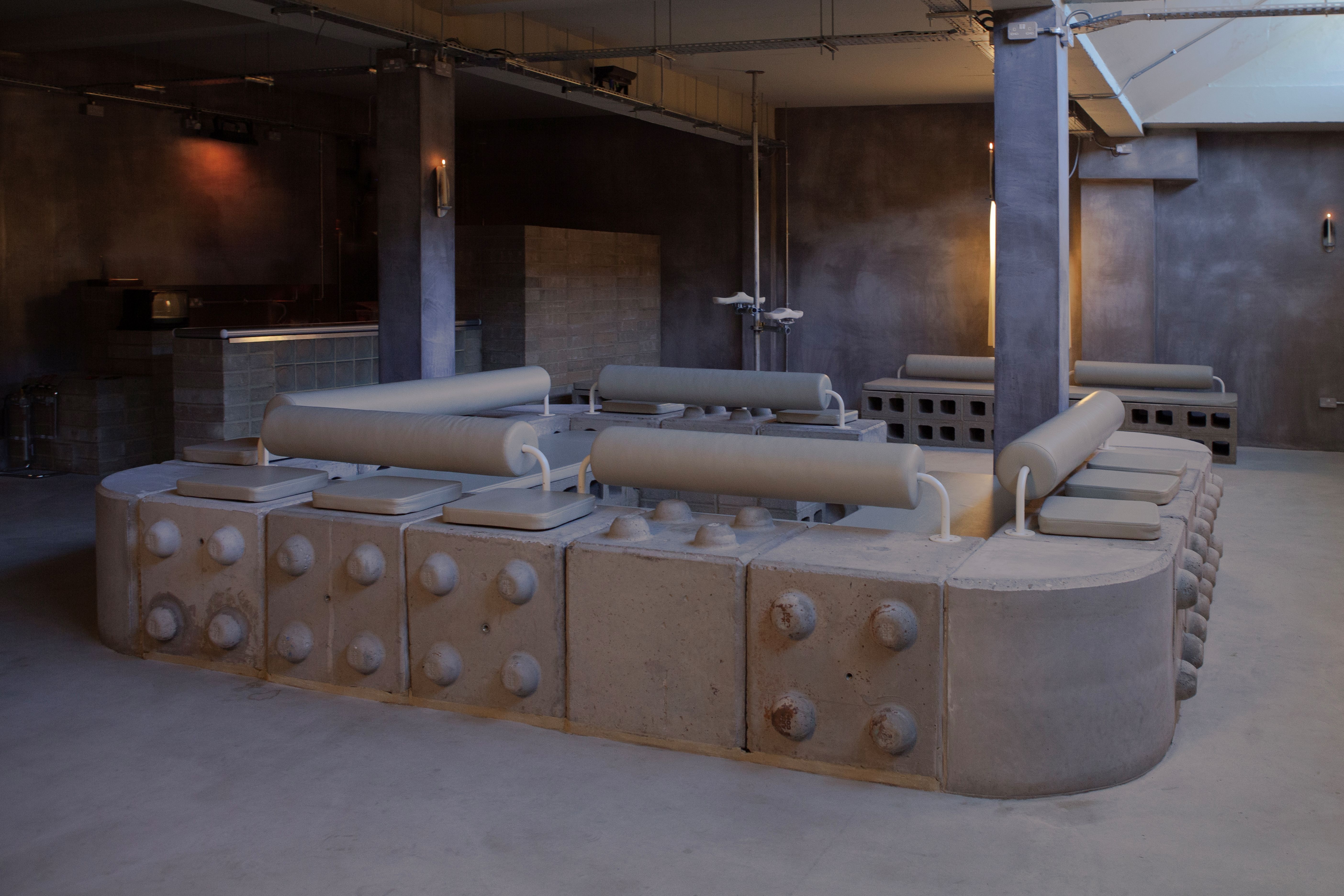view of a new space in Dalston for intimacy, work and community, where concrete structures sit alongside rubber-cast seating