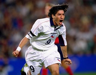 Ivan Zamorano celebrates after scoring for Chile against USA in the bronze medal match at the 2000 Olympics.