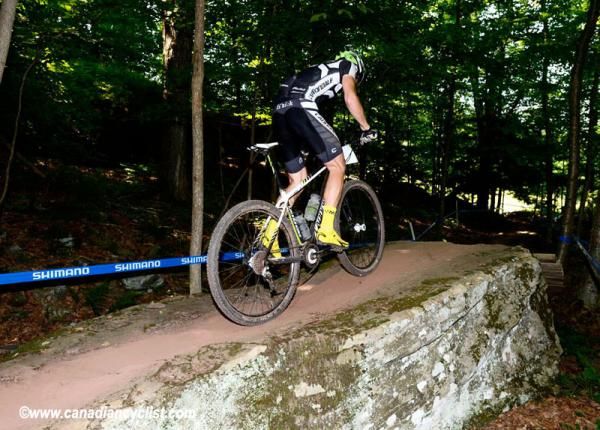 Heading over the rock slab drop at the Troll Trail