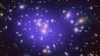 A galaxy with a large reservoir of dark matter (purple overlay) in its center.