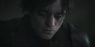 Unmasked Robert Pattinson looking moody in The Batman