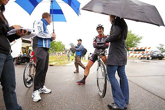 Kristin Armstrong's postrace interviews under the umbrellas.