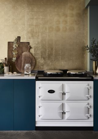 Annie Sloan Chalk Paint in Aubusson Blue with Brass Leaf gilding on splashback