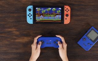 8BitDo's SN30 comes in a variety of colors, from the traditional SNES and Super Famicom schemes to this navy blue inspired by the Game Boy Pocket. (Credit: 8BitDo)