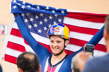 Chloe Dygert celebrates her win in the women's individual pursuit
