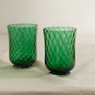 Set of two Murano green glasses