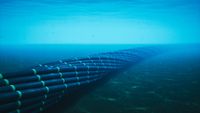 An image of an undersea cable under water.