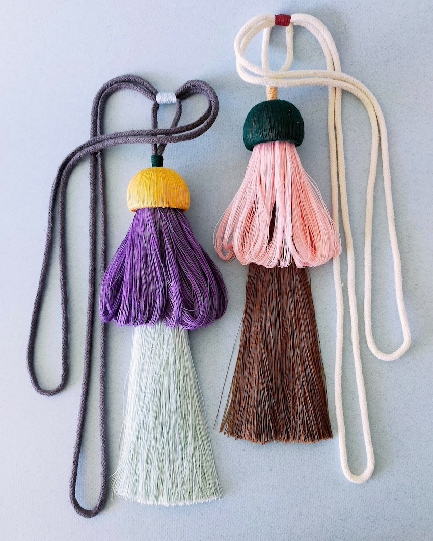 Colorful passementerie tassels in contrasting shades