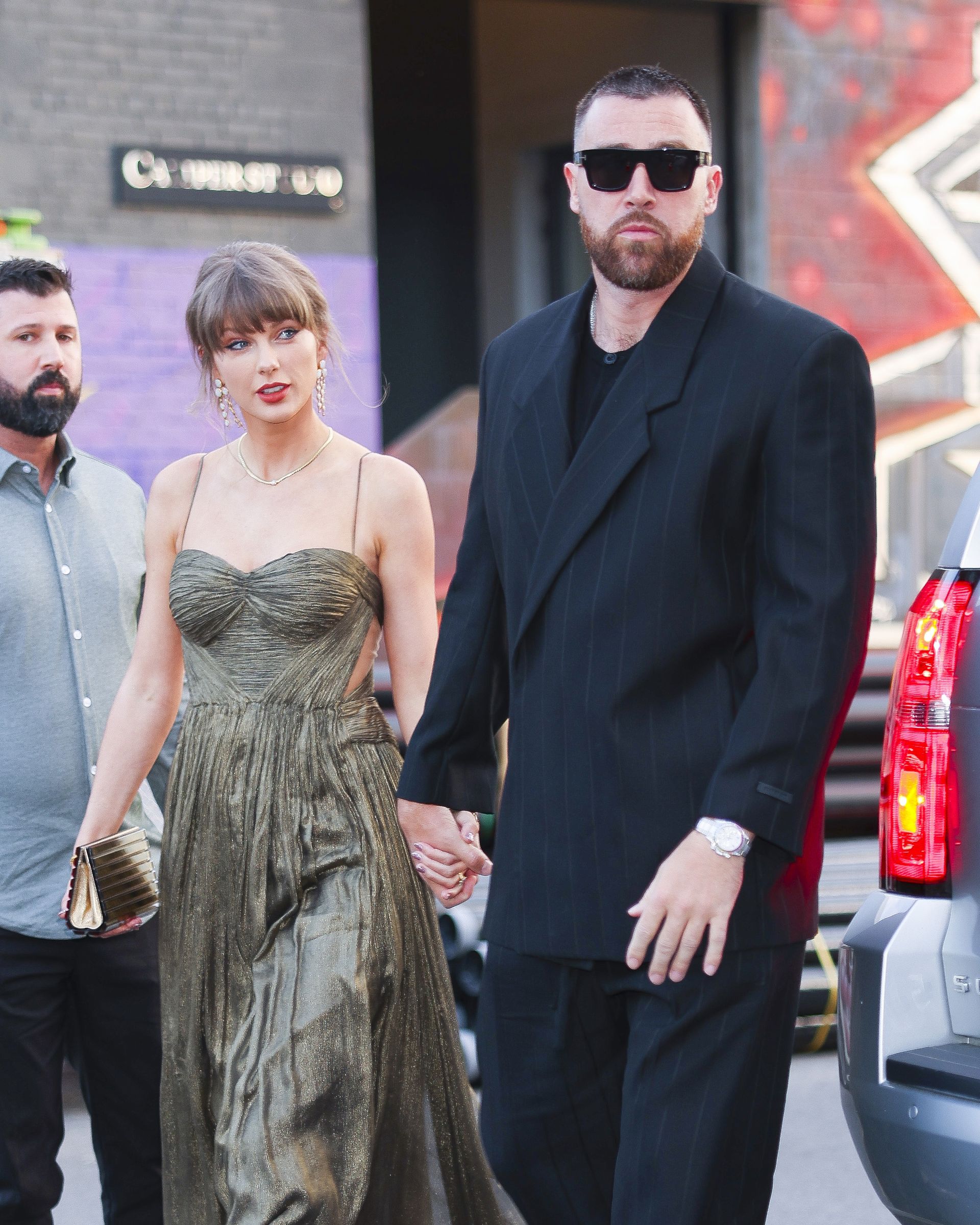 Taylor Swift and Travis Kelce attend a wedding