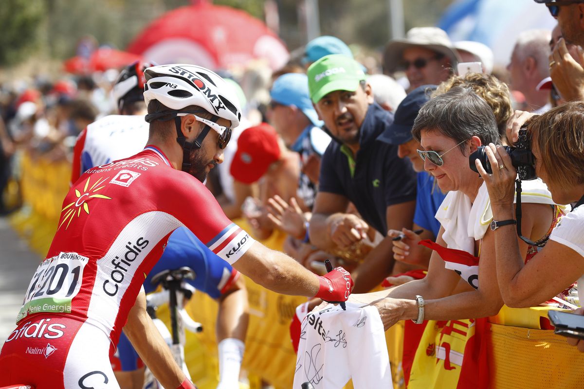 Nacer Bouhanni signs autographs