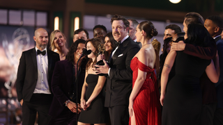 Jason Sudeikis and cast and crew accept the Outstanding Comedy Series award for "Ted Lasso" on stage during the 74th Annual Primetime Emmy Awards