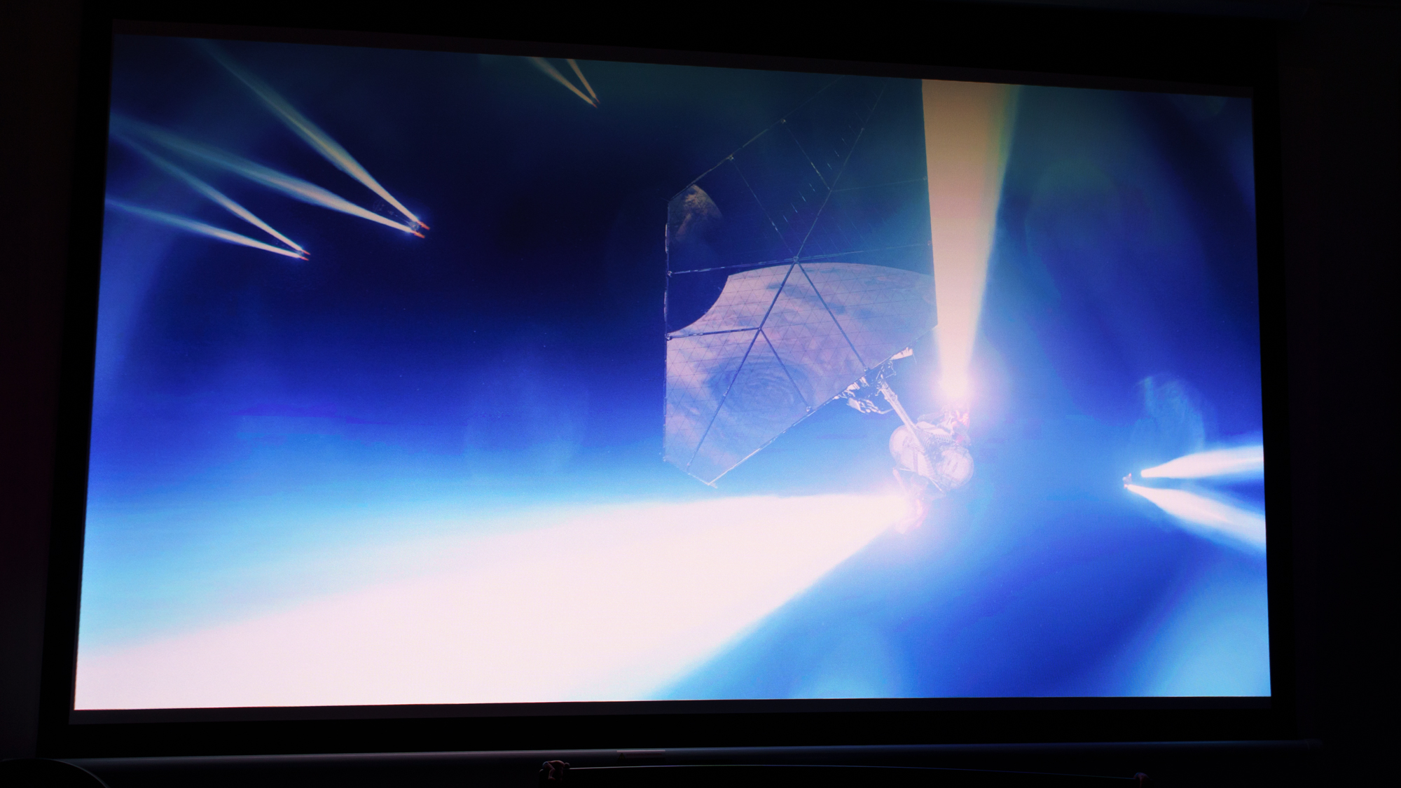A picture projected on a screen by a JMGO N3 Ultimate projector