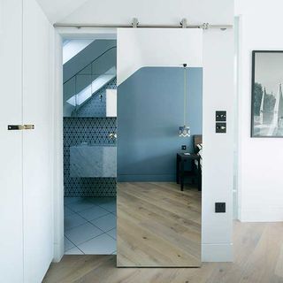 small bathroom with sliding door