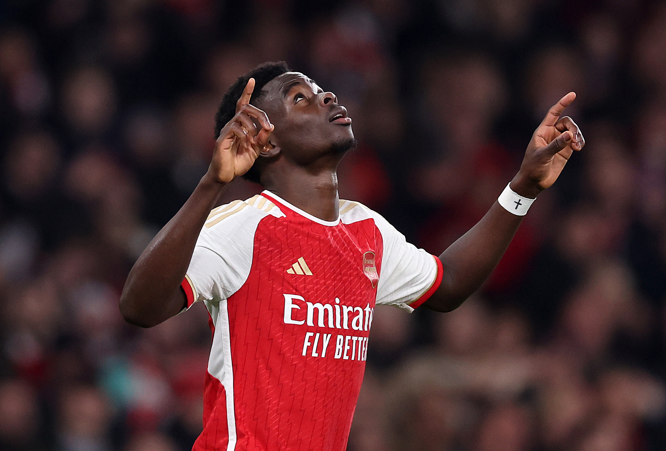 Bukayo Saka celebrates after scoring for Arsenal against Newcastle in February 2024.