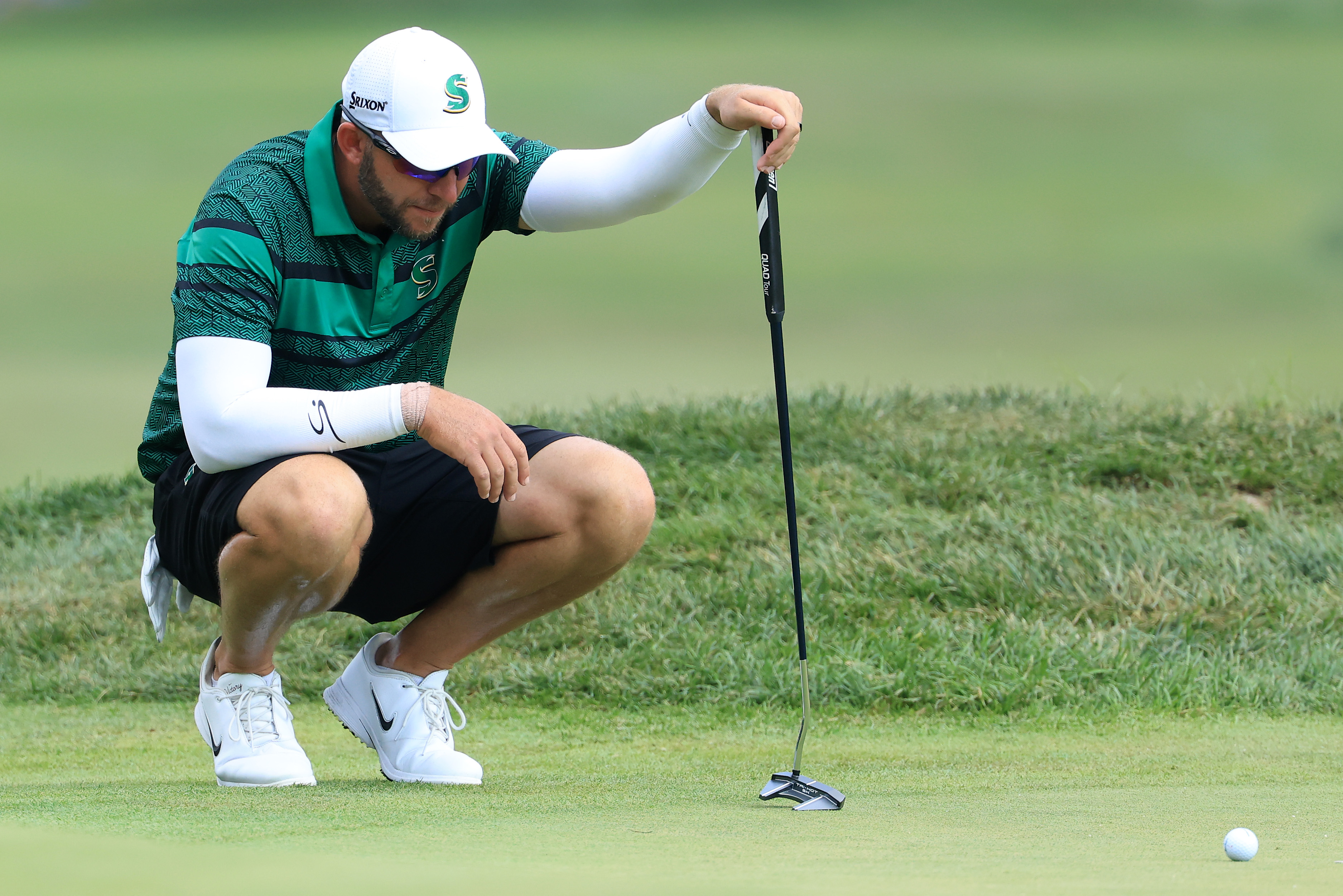 Dean Burmester lines up a putt