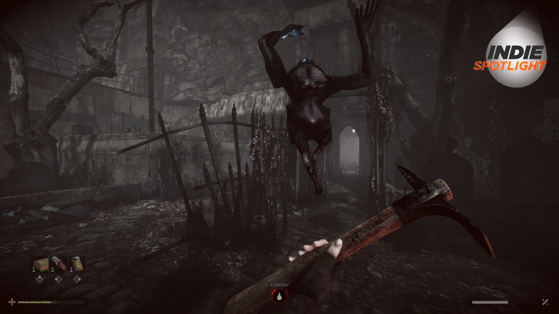 Total Chaos screenshot of a creature springing up in the air towards the protagonist, who wields a wrench in a dark, wooded area. The Indie Spotlight logo can be seen in the top right-hand corner of the image