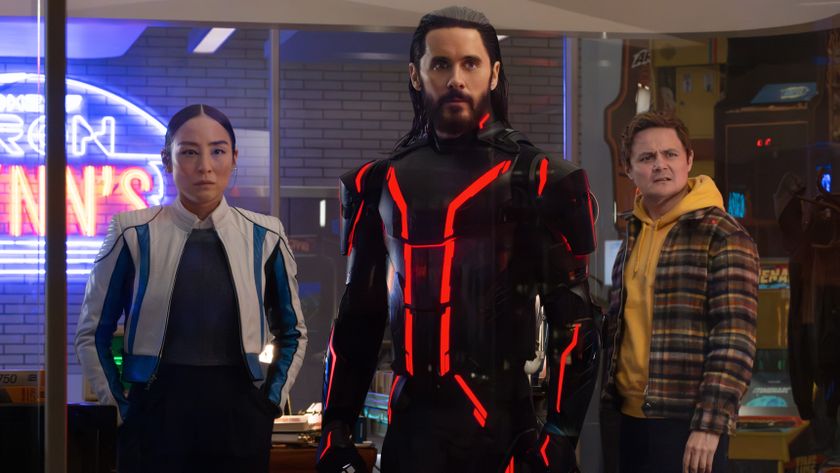 L-R: Eve Kim (Greta Lee), Ares (Jared Leto) and Seth (Arturo Castro) in a scene from Disney&#039;s &quot;TRON: Ares&quot;