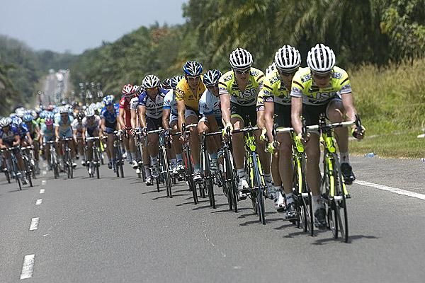The team from ISD-Neri drive the peloton towards the final twenty kilometres of stage three.