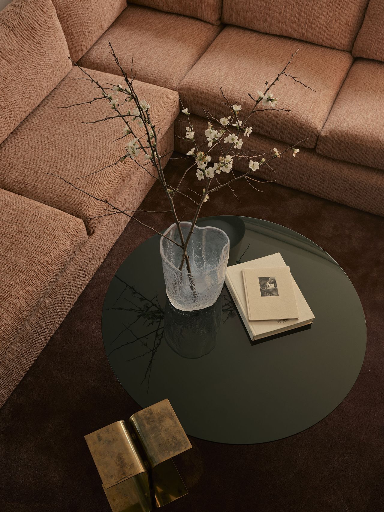 Living room in Smac Studio's renovated Art Deco home in Woollahra, Sydney, featuring a Pierre Augustin Rose sectional sofa.
