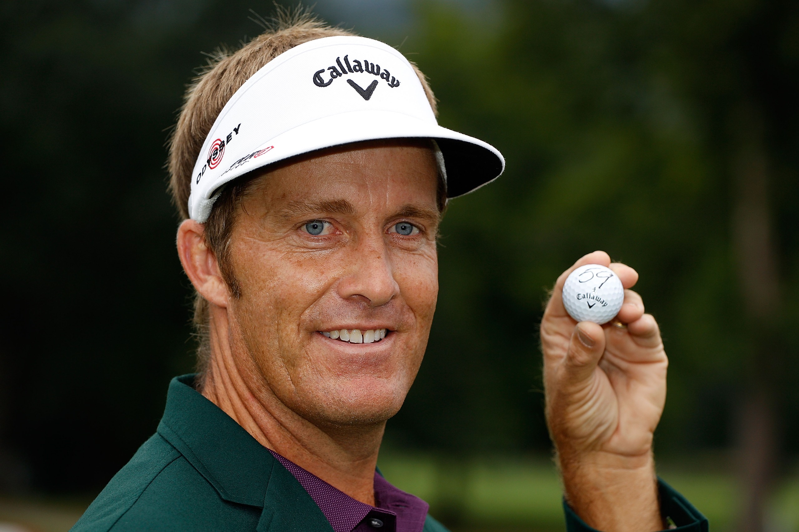 Stuart Appleby with his golf ball after shooting a 59