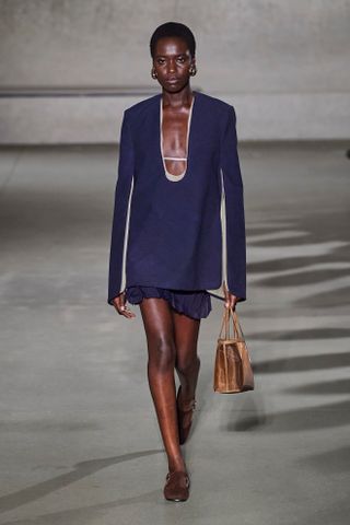 Tory Burch model walking on the runway.