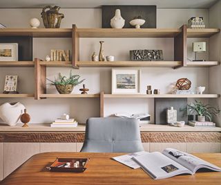 office with styled wooden shelves