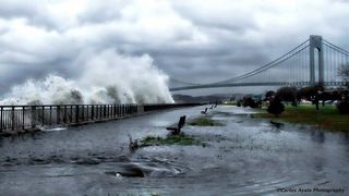 Waves crash ashore near the Verrazano Bridge in Brooklyn, N.Y., ahead of Hurricane Sandy's landfall on Monday, Oct. 29.