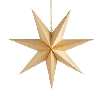 A gold paper star decoration