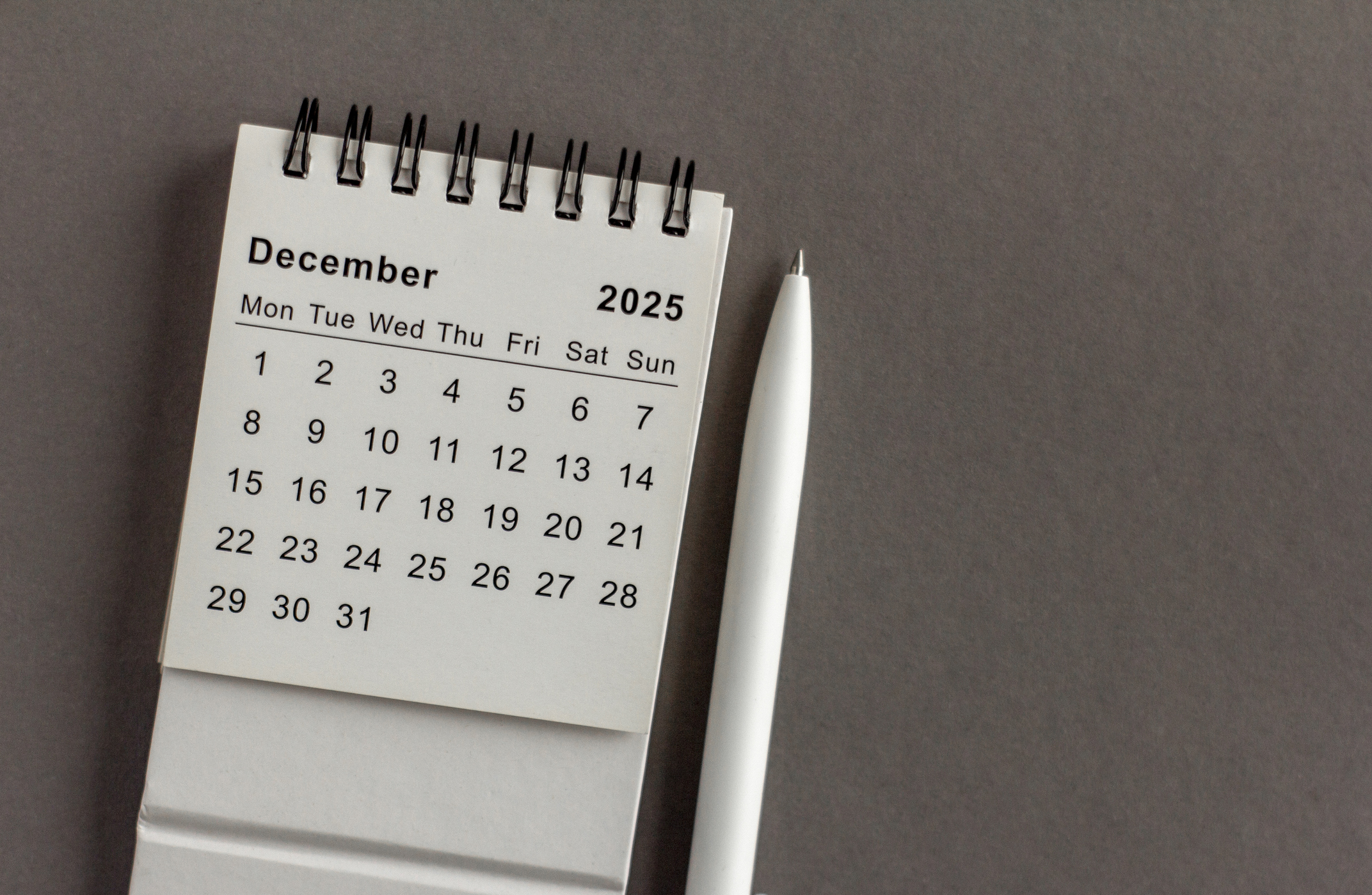 December calendar for 2025 on a gray background