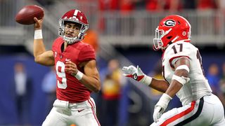 Alabama quarterback Bryce Young (No. 9) and Georgia linebacker Nakobe Dean (No. 17)