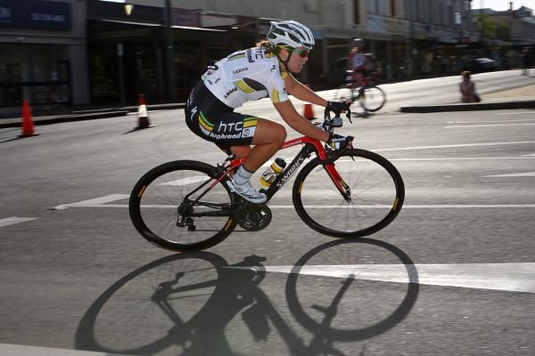 Chloe Hosking (HTC-HighRoad) corners as the sun sets, creating long shadows.