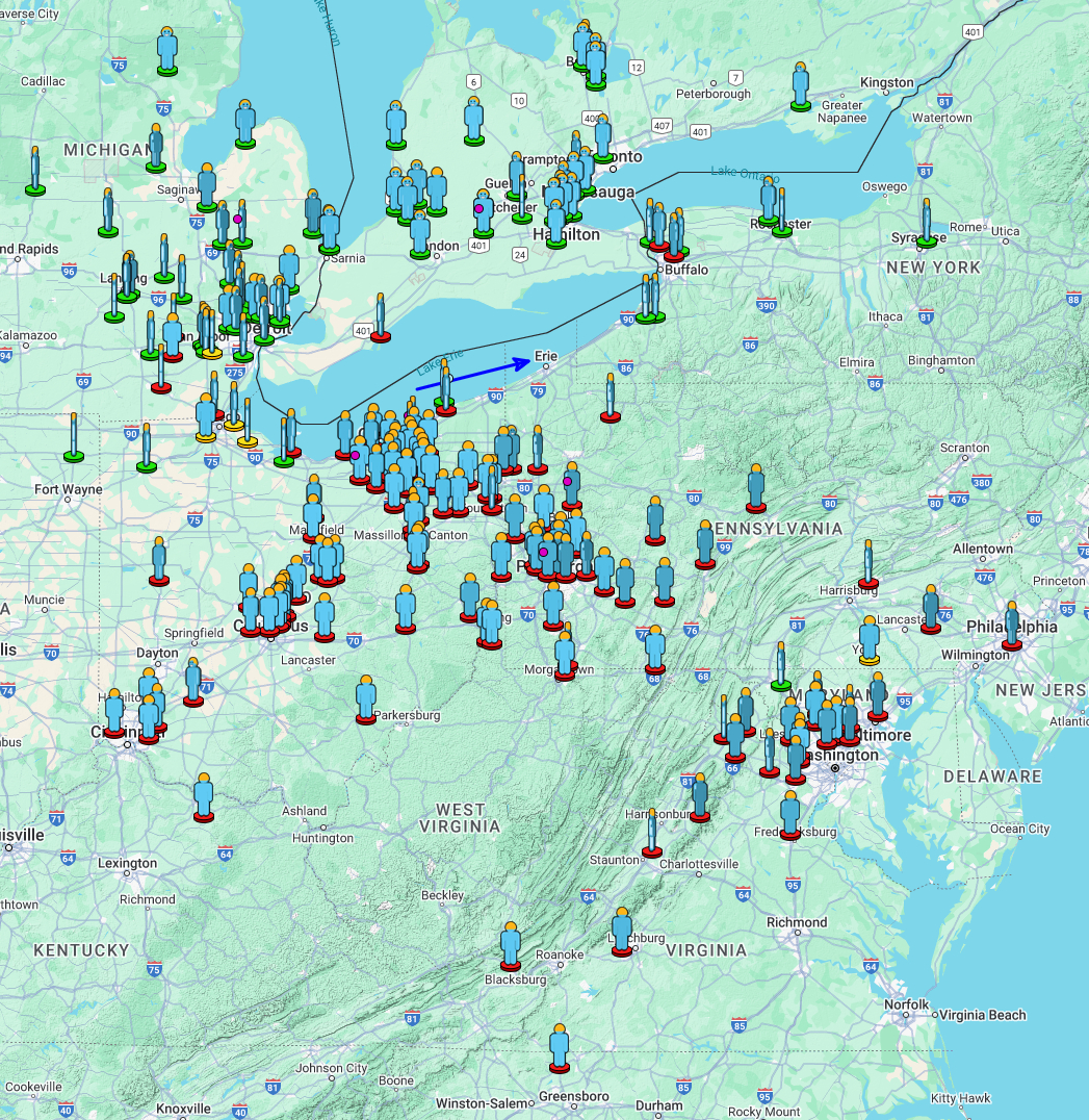 a green map of the land around Lake Erie, with icons of blue-bodied people with yellow heads surrounding the lake, some with green bases, some with red. A blue line and arrow points east from the middle of the lake, just below the US-Canada border.