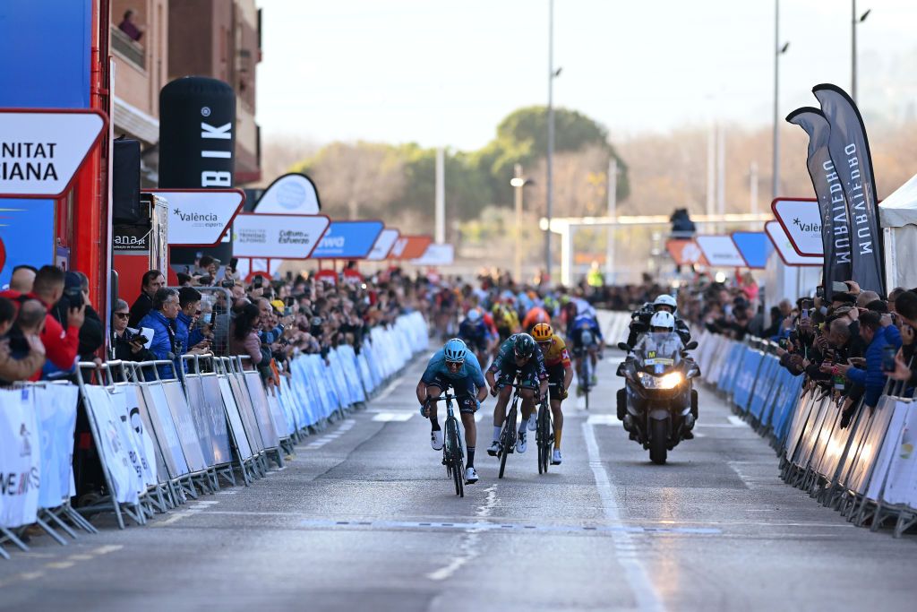 SAGUNTO SPAIN FEBRUARY 03 LR Simone Velasco of Italy and Astana Qazaqstan Team Bob Jungels of Luxembourg and Team BORA Hansgrohe and Jonas Gregaard of Denmark and UnoX Pro Cycling Team sprint at finish line during the 74th Volta a la Comunitat Valenciana 2023 Stage 3 a 1451km stage from Btera to Sagunto VCV2023 VoltaValenciana on February 03 2023 in Sagunto Spain Photo by Dario BelingheriGetty Images