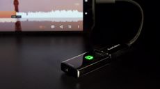 Best headphones DAC 2022, image shows EarMen Sparrow connected to Android phone