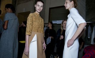 Female models wearing gold and white clothes from the Gabriele Colangelo A/W 2015 collection