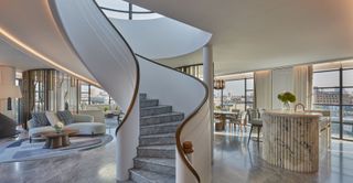 Image of the spiral staircase leading up to the workplace and terrace