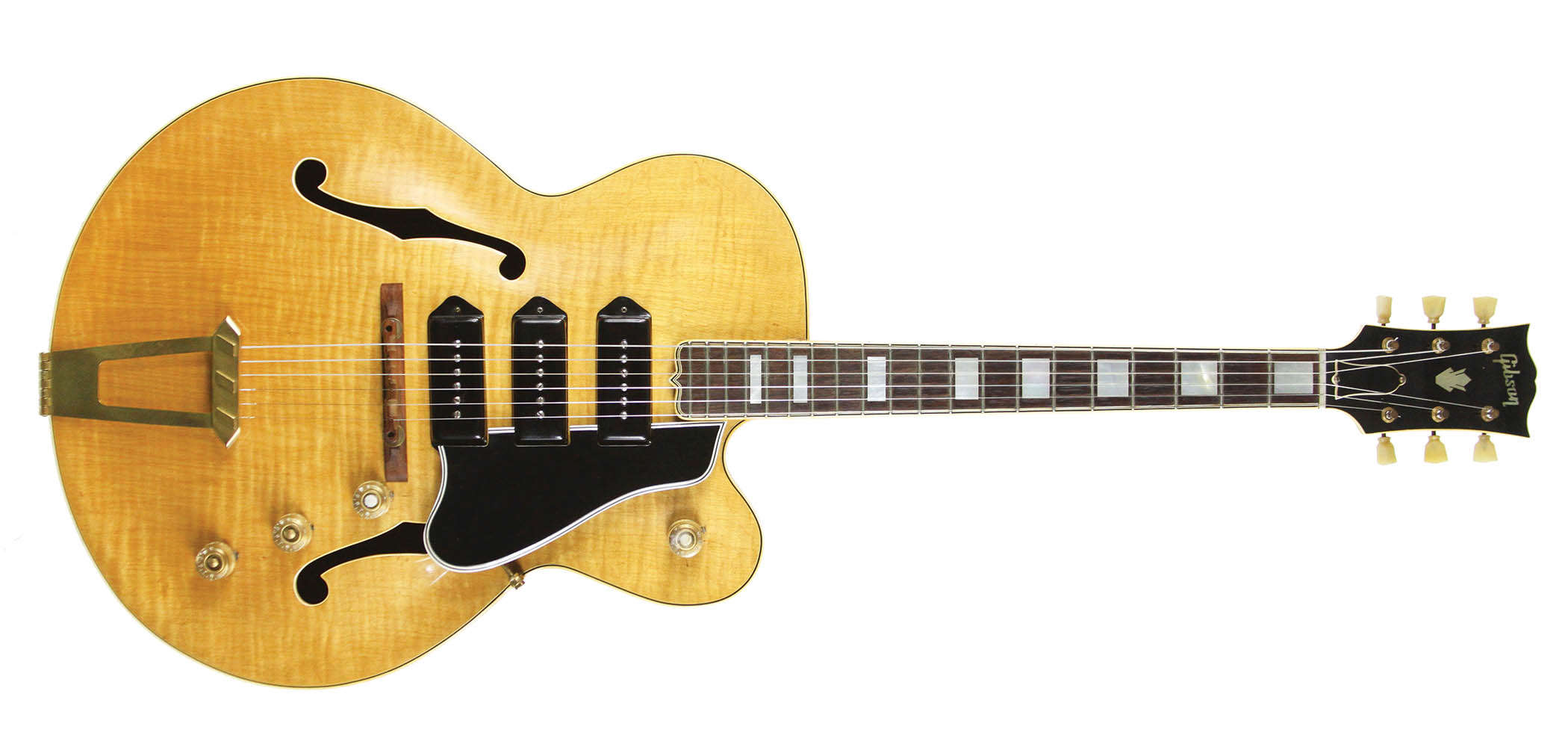 The Gibson ES-5 was essentially an ES-350 with a third pickup, and Patent Applied For humbuckers replaced the&amp;nbsp;P-90s in 1957