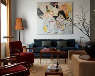 New York apartment living room in cosy colours with mid century furniture