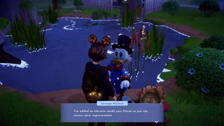 Scrooge chats to your about your house by a pond in Disney Dreamlight Valley