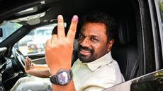 Sri Lankan President Anura Kumara Dissanayake shows off ink-stained finger after voting