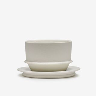 white cup and saucer 