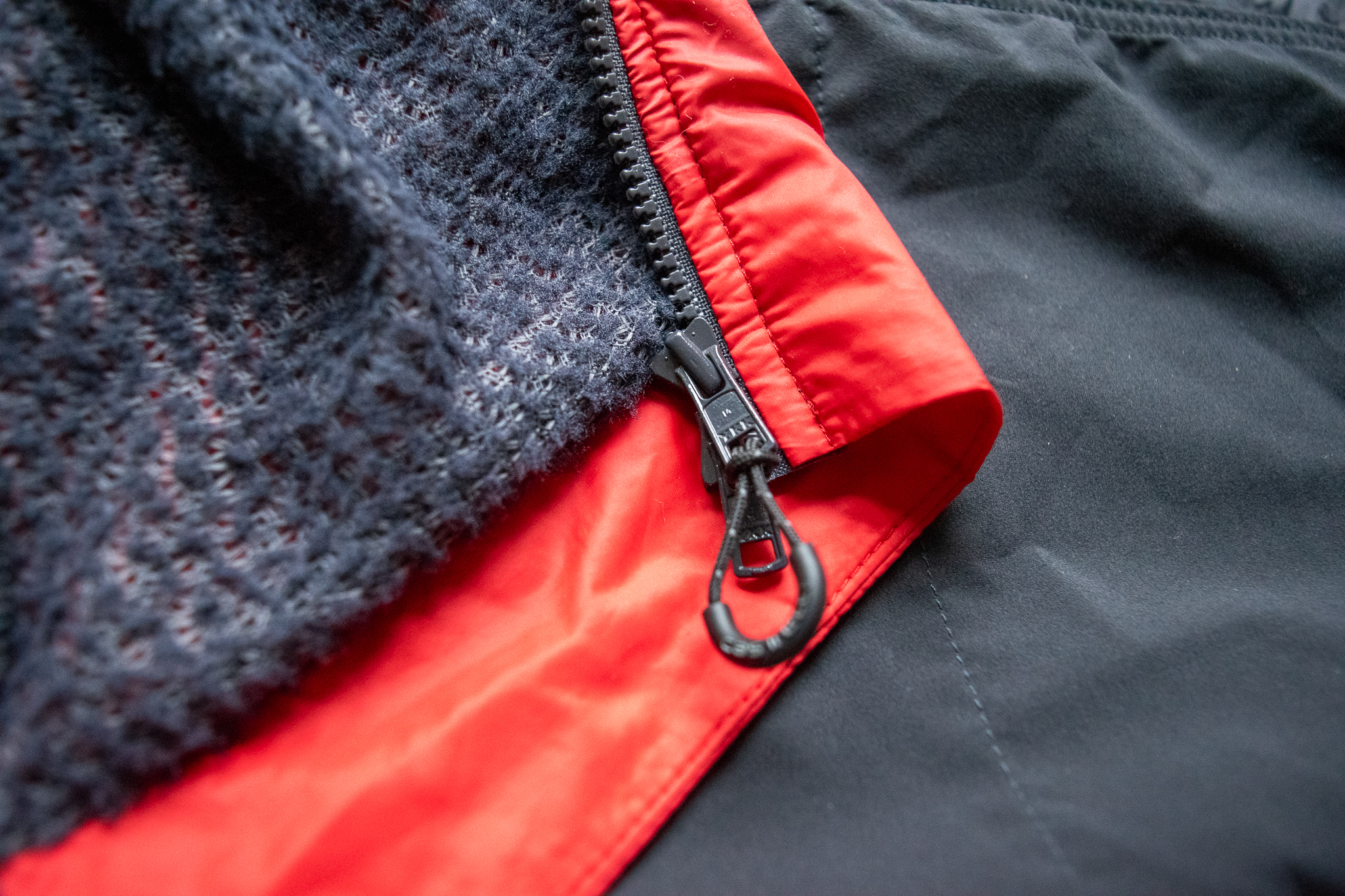 A Castelli Unlimited Puffy vest closeup showing the zipper