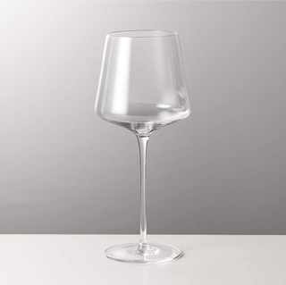Elongated stem wine glass.