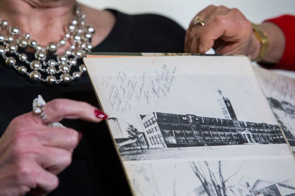 Beverly Young Nelson holds the yearbook she says Roy Moore signed.