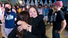Adelita Grijalva hugs a supporter at a primary election-night party at El Casino Ballroom