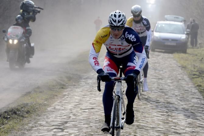Andre Greipel (Lotto Belisol) makes his way through the Arenberg forest.