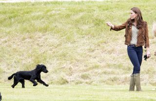 Catherine, Duchess Of Cambridge With Her Dog Lupo