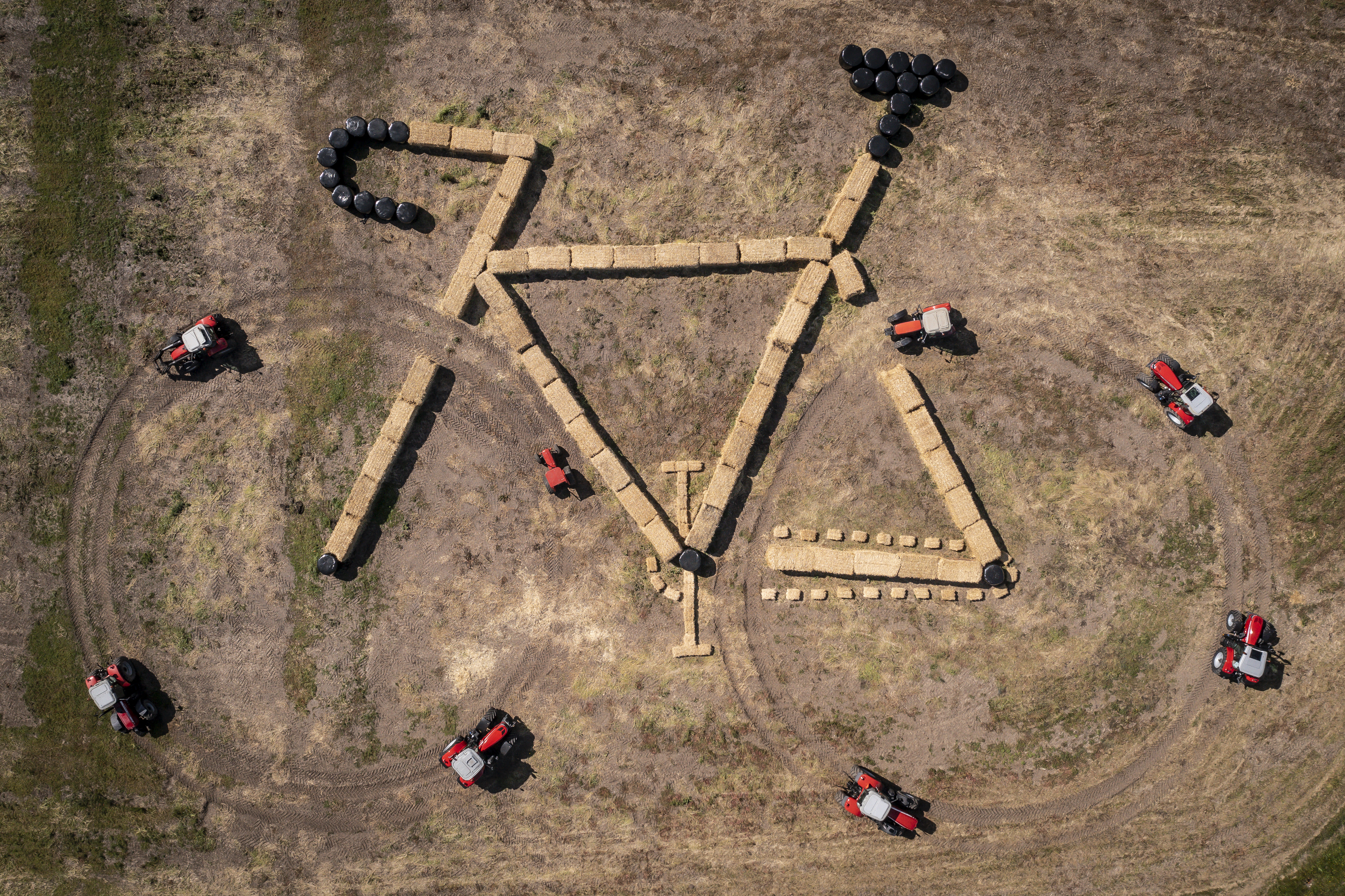 Tractors and hay bales make a moving bike