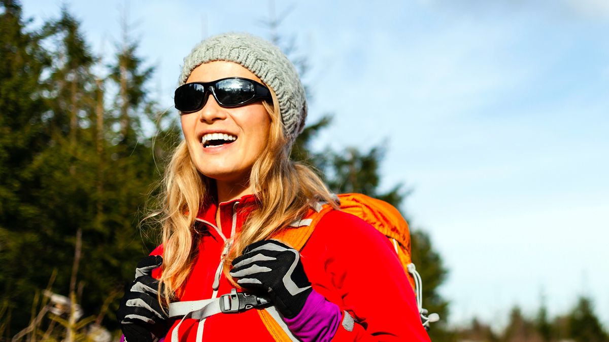 Couple walking and hiking on mountain trail