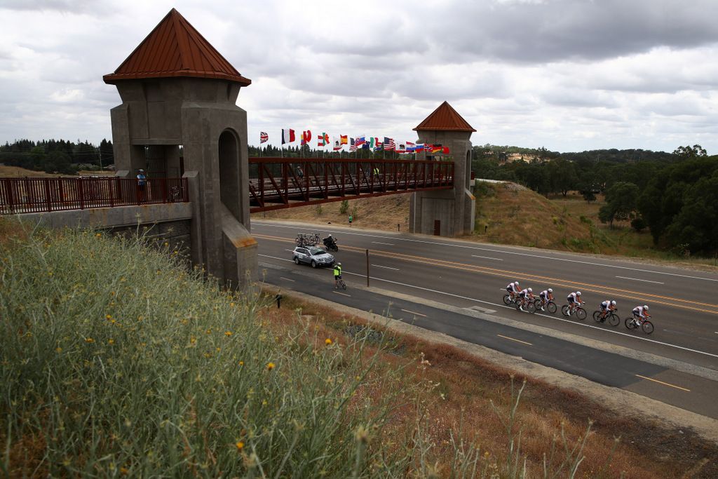 The Rabo-Liv team pass under a bridge
